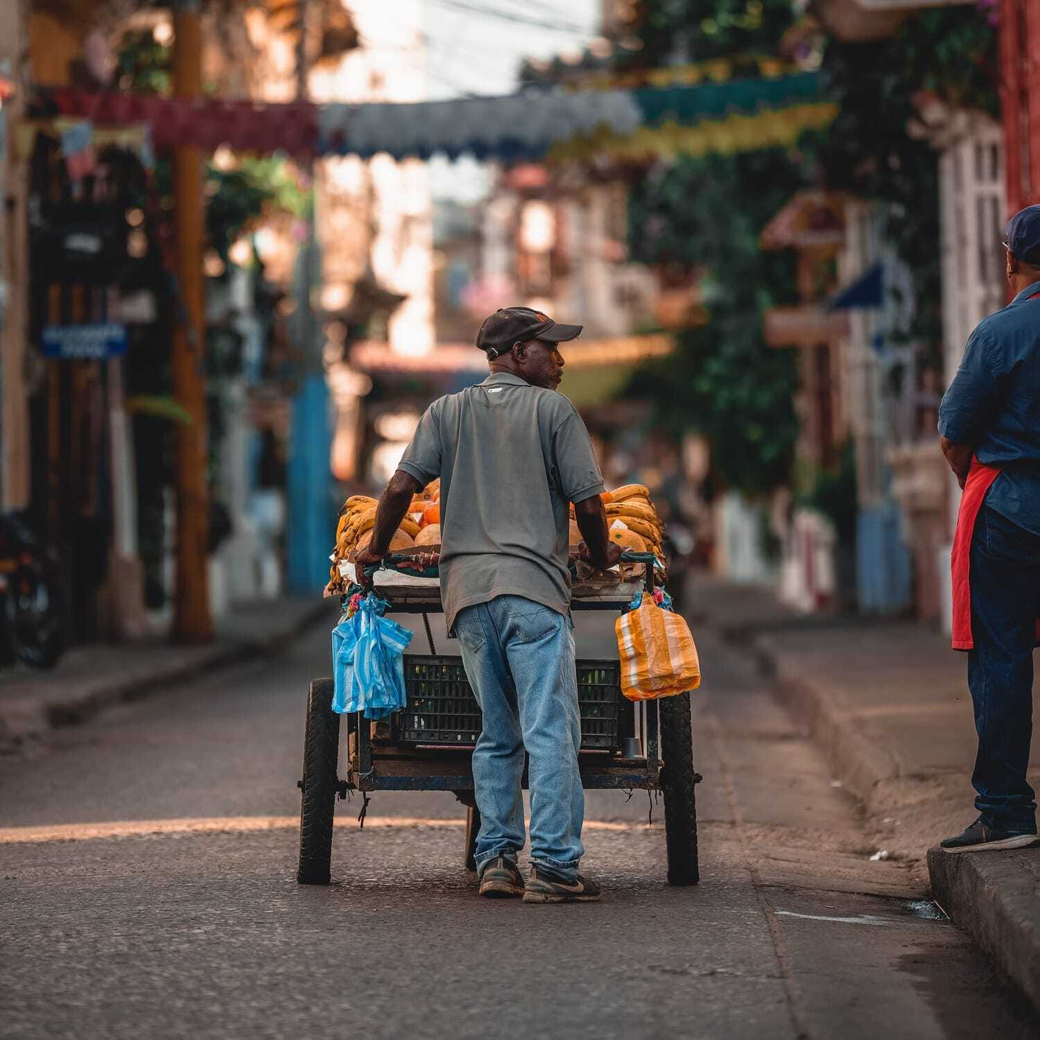 A man with a cart, cropped